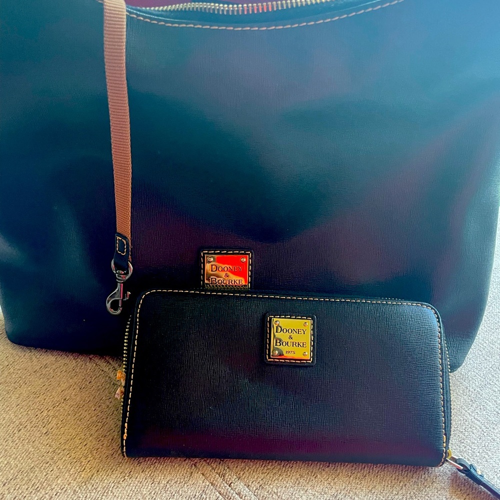 Black Dooney and Bourke bag with matching wallet
